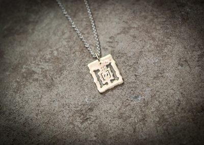 TPA1 - Small brass Angkor Wat on silver chain