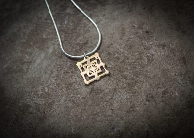 TPB2 - Large brass Bayon on silver chain